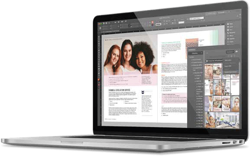 Photo of a laptop displaying InDesign