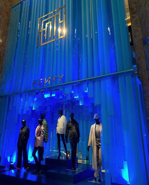 Image of Fenty display with clothed mannequins