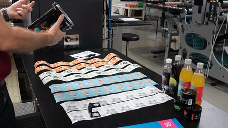 Photo of Skanem employee inspecting labels